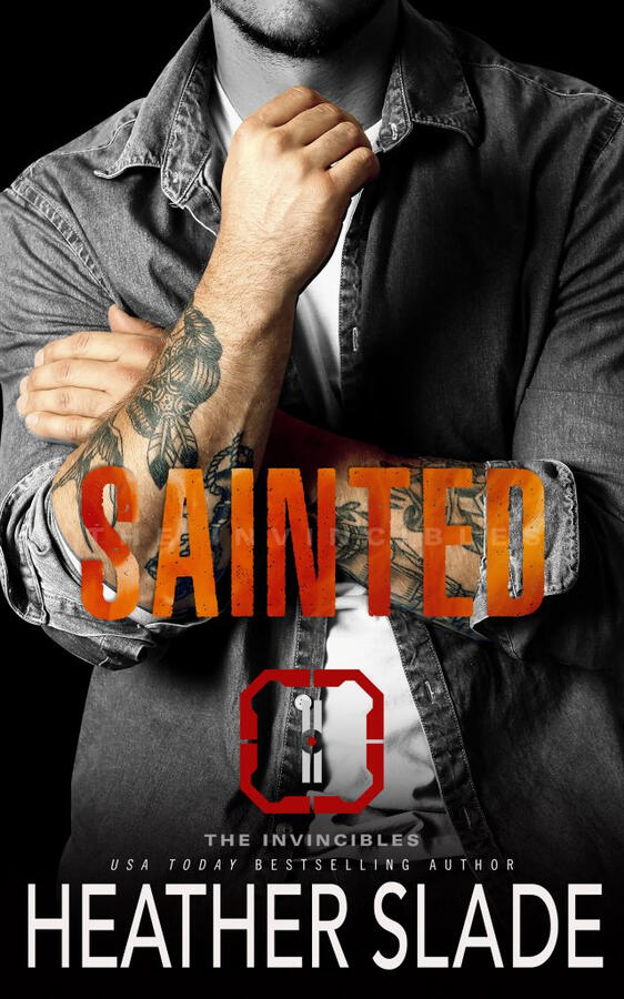 Tattooed man crossing his arms.